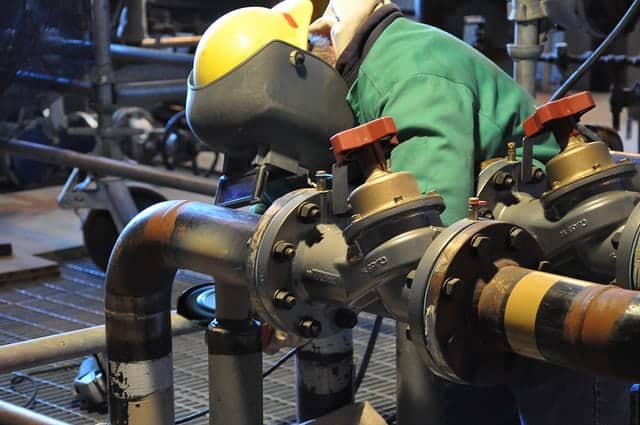 Welder welding with TIG on a Pipeline