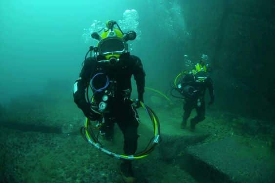 Divers working underwater