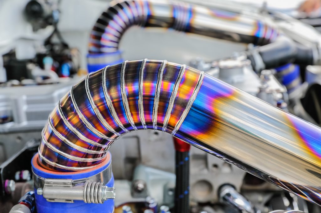 TIG welded seam on stainless steel pipe in racing car