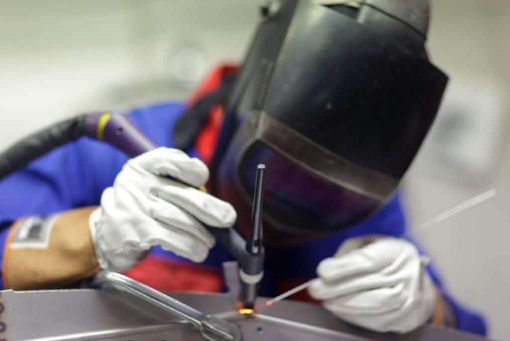 image of a welder doing a TIG weld