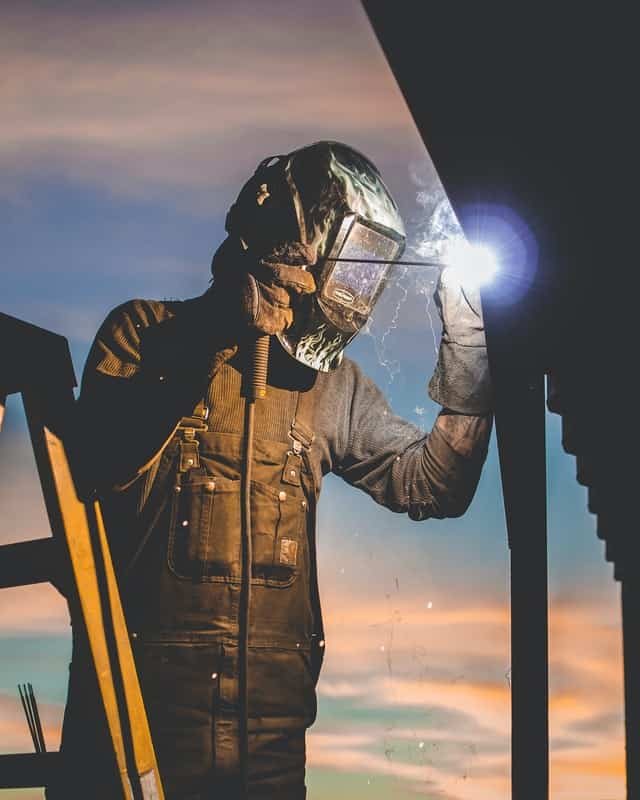 image of a worker making a stick weld