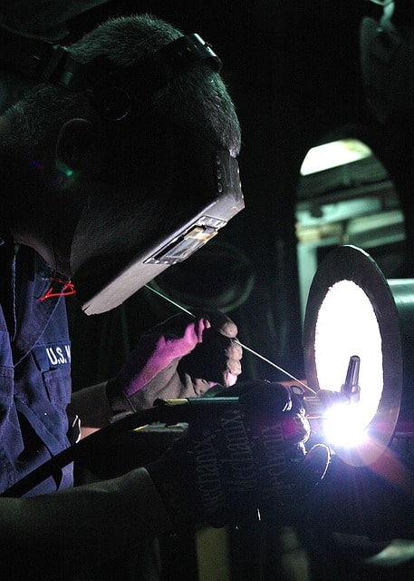 image of a worker welding