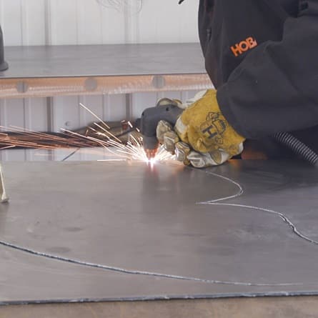 image of hobart 40i airforce plasma cutter in action