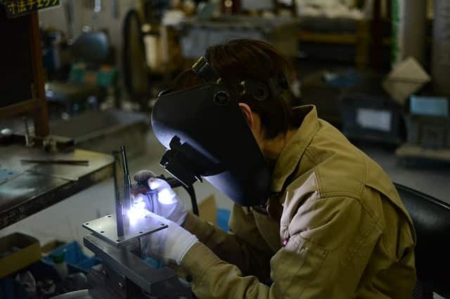 image of a worker making a TIG weld