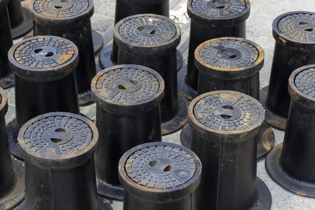 Circular cast iron water valve covers