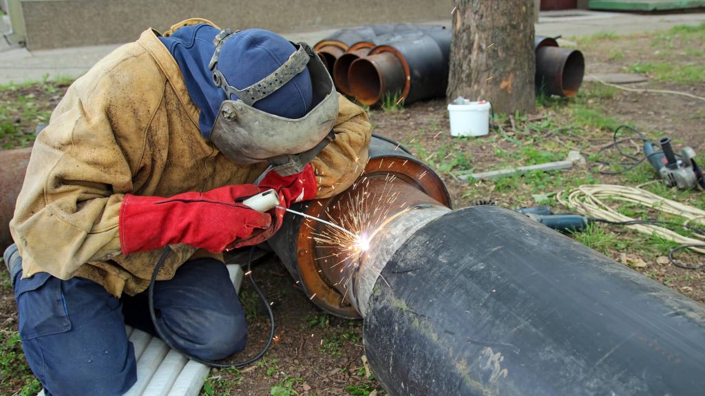 image of a pipeline worker wearing full leather jacket protection