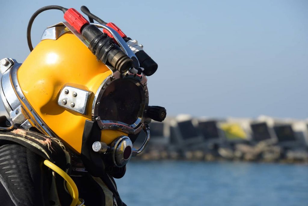 image of a diver with his Kirby Morgan hat