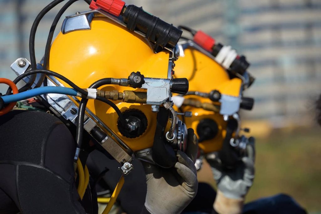 image of divers with their hats