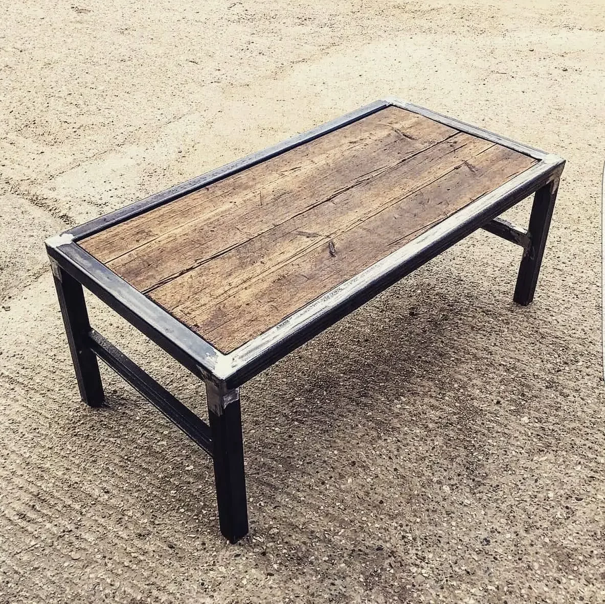 DIY coffee table made from a square tubes and wood 