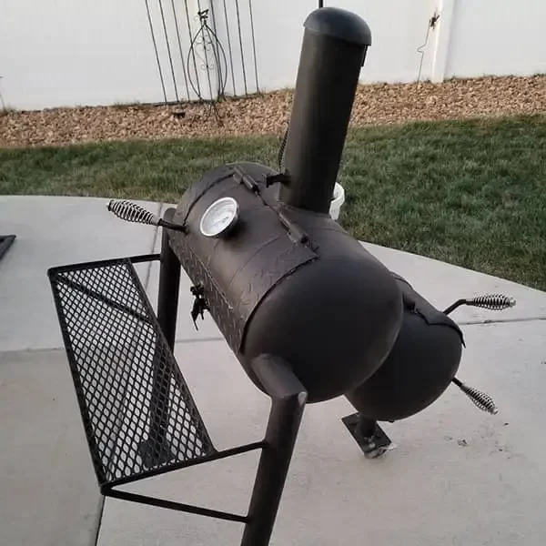 Black DIY Smoker welded from a metal barrel