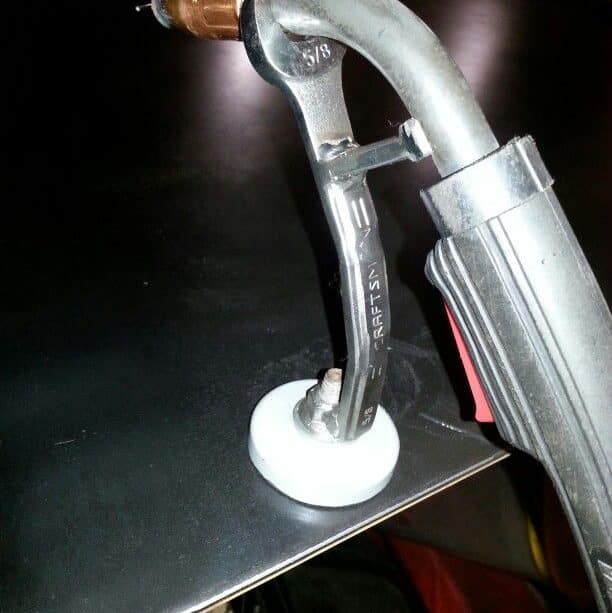 Image of a DIY MIG gun holder made from a wrench