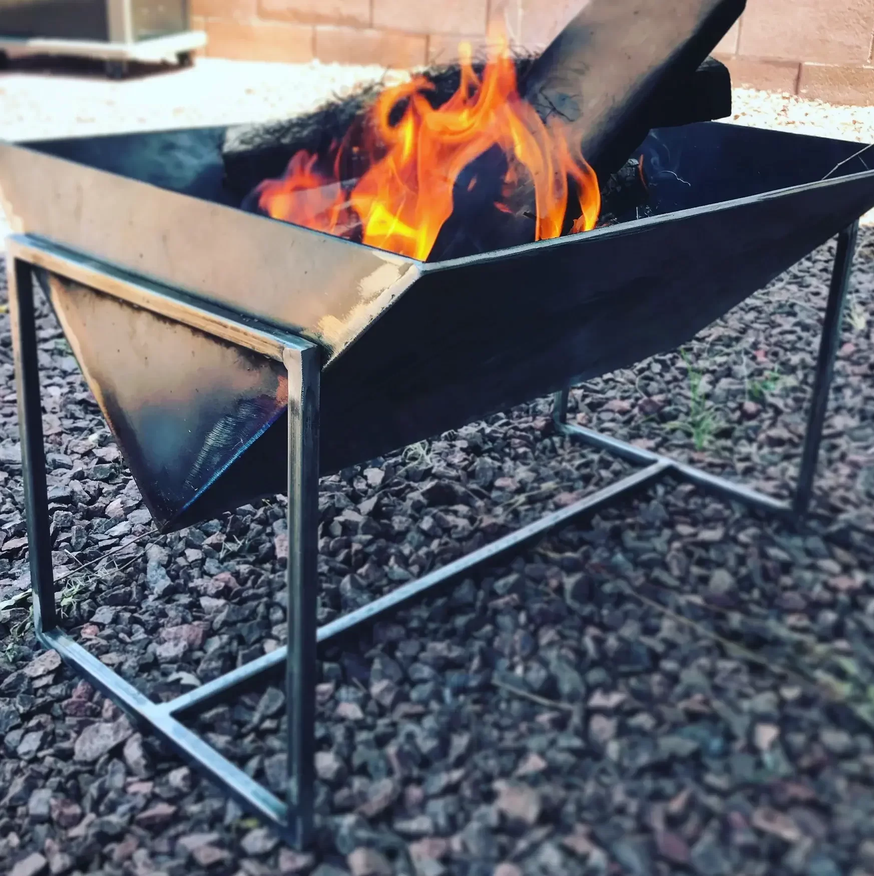 image of a DIY metal welded outdoor fire pit 
