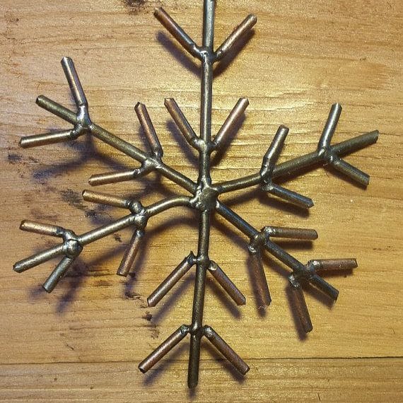 metal welded sculpture of a snoflake