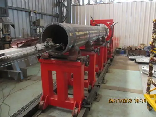 image of a pipe cladding machine