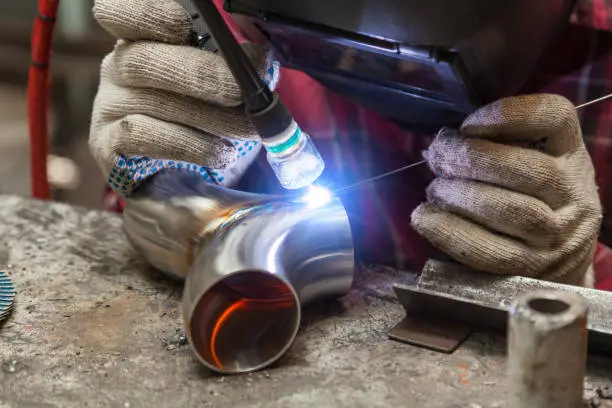 Image of the TIG welding process on a pipe.