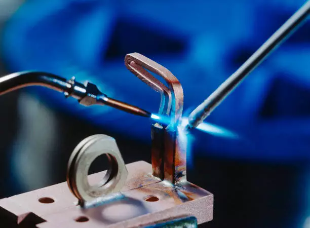 Image of a brazing with added material on a metal part
