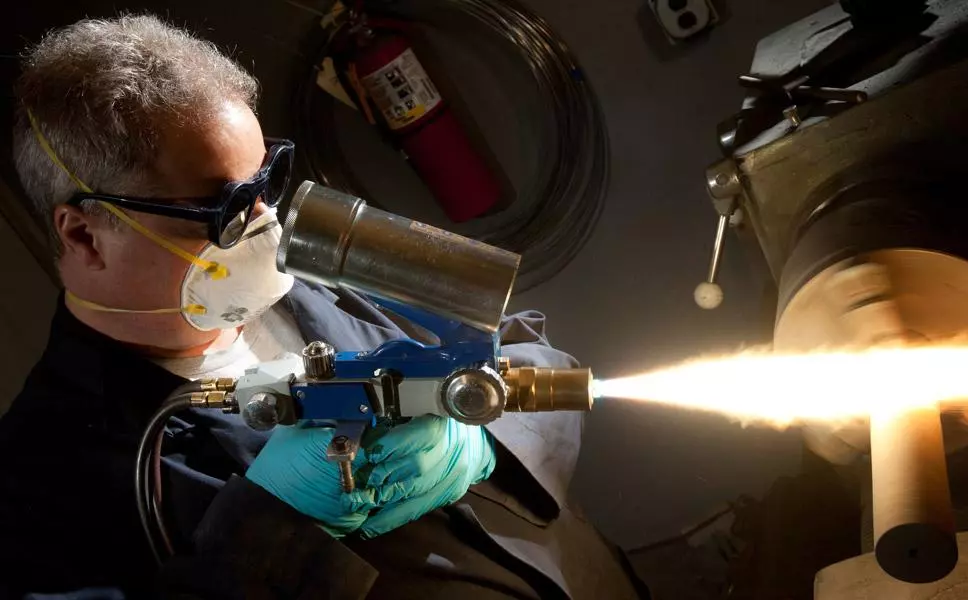 Welder with the flame sprayer for flame spraying process