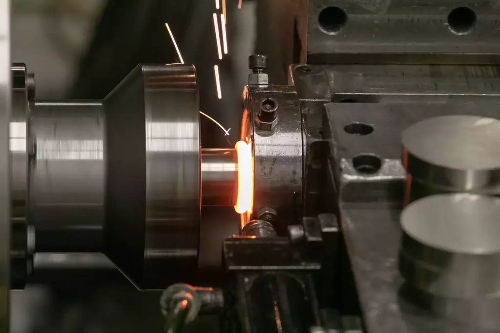 Image of welding process named inertia friction welding.