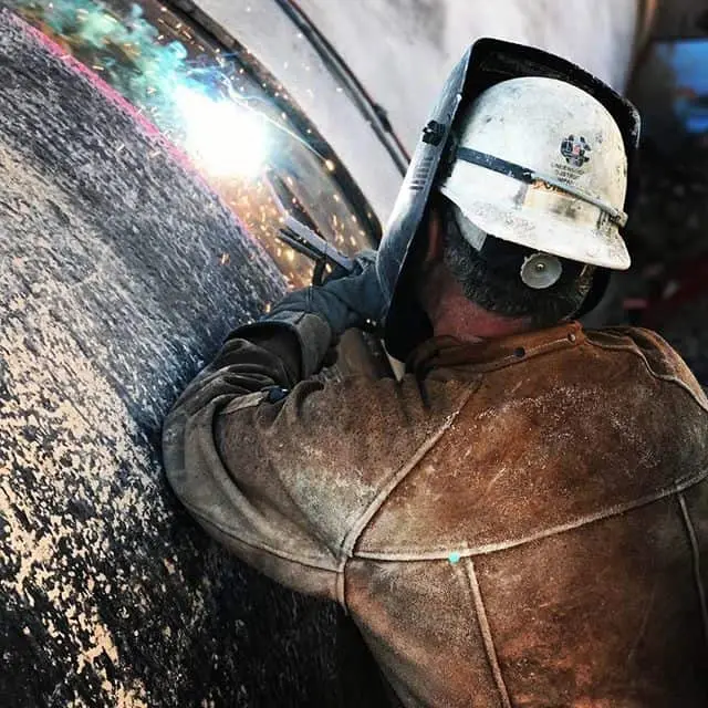 pipe welder at work