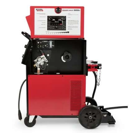 Image of a Lincoln Power Wave 300C Multi Process Welder with the open hatch and view of the wire feeding mechanism and welding instrucitons.