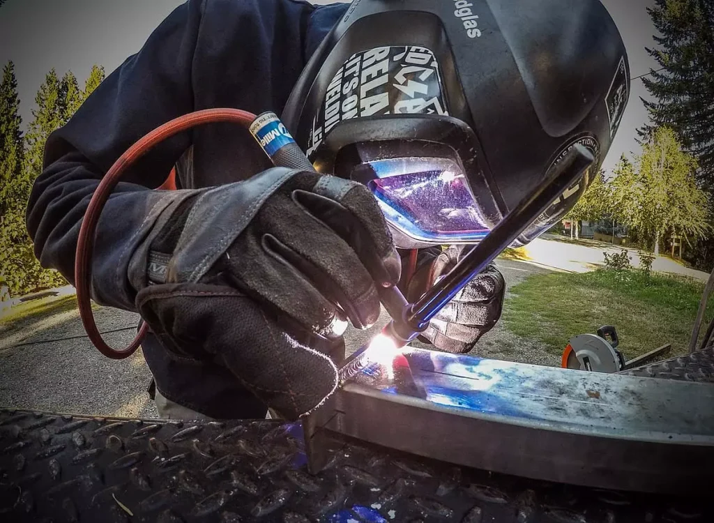 Image of a welder working on a TIG welding project 
