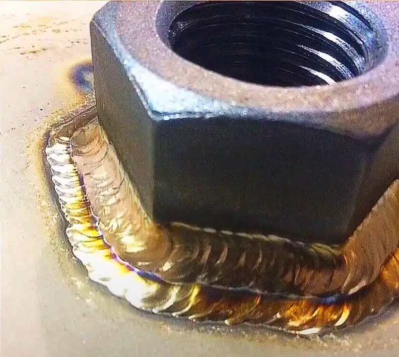 Mild Steel screw welded to the stainless steel surface with TIG Welding