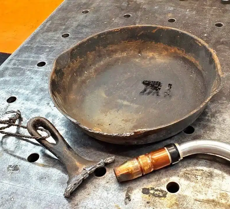 mig welding broken cast iron pan